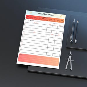 May include: A white Focus Time Planner with a colorful header and a gradient orange and pink footer. The planner includes sections for tasks, dates, and time tracking. A pen, pencil, and compass are next to the planner.