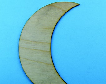 May include: A wooden crescent moon shape, featuring a light tan color and visible wood grain. The moon is set against a bright blue background. This craft supply is ideal for DIY projects and decorations.