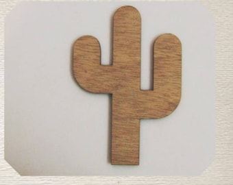 May include: A wooden cutout of a cactus in a light brown color. The cactus has a simple design with two arms and a single stem.