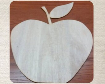May include: A wooden apple cutout with a leaf, perfect for crafting and decorating.