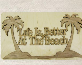 May include: Wooden sign with two palm trees and the text "Life Is Better At The Beach".