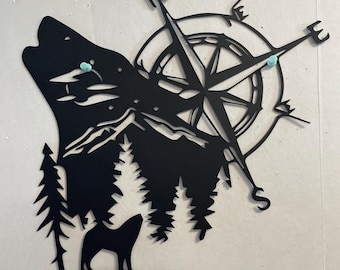 Metal wall decoration of a wolf and compass