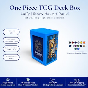 Könnte beinhalten: Eine leuchtend blaue One Piece TCG Deckbox mit einem Luffy Straw Hat Kunstpaneel. Die Box zeigt den Text One Piece Card Game mit einer Kompassgrafik auf der Vorderseite und dem One Piece Logo an der Seite. Sie enthält einen magnetischen Deckel.