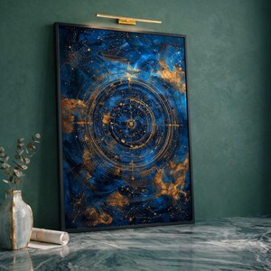 May include: A framed art print featuring a celestial design. The artwork showcases a deep blue background with gold accents, depicting constellations and a circular astrological chart. The print is displayed on a marble surface.