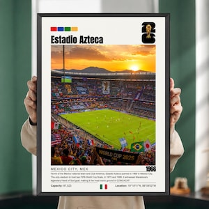 May include: A framed poster featuring a sunset view of Estadio Azteca in Mexico City. The image shows a crowded stadium with a green pitch, the text Estadio Azteca, World Cup 2026, and 1966, along with a description of the stadium's history.