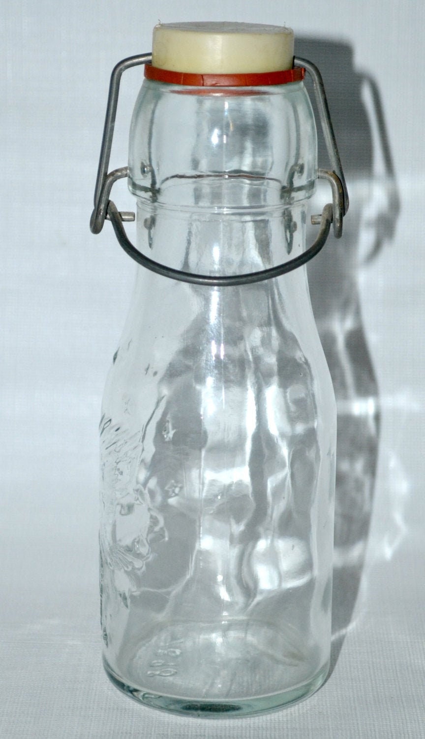 Download Vintage Clear Glass Milk Soda Bottle with Embossed Eagle ... Yellowimages Mockups
