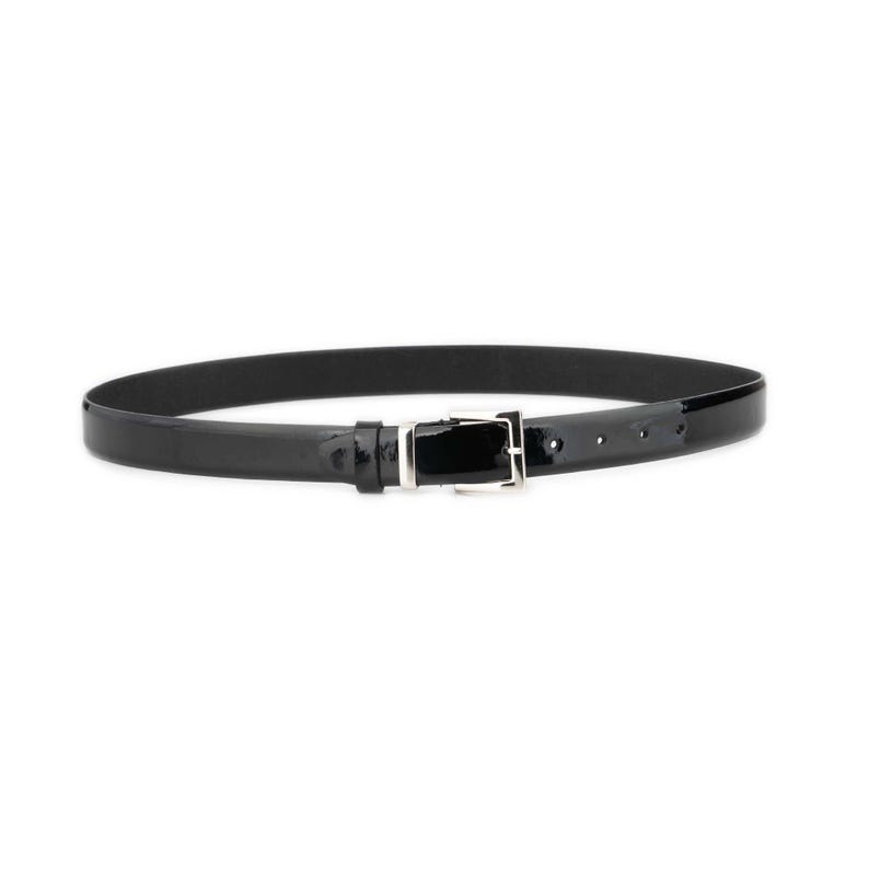 Black patent leather belt for men with silver buckle, slim glossy dress belt for formal wear and office outfits on white background