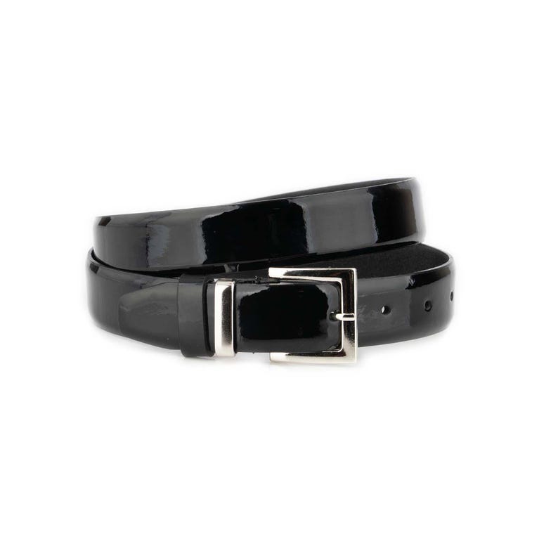 Black patent leather belt for men with silver buckle, slim glossy dress belt for formal wear and office outfits on white background