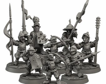 May include: A collection of miniature fantasy figures, likely for tabletop gaming. The figures are gray and depict goblin-like warriors in various poses, armed with spears, bows, and swords. Each figure stands on a circular base, suggesting a game piece or collectible.