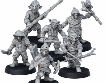 May include: A collection of six gray goblin miniatures, each posed on a black base. The goblins are armed with various weapons, including spears, swords, bows, and maces. They wear armor and helmets, and have exaggerated facial features.