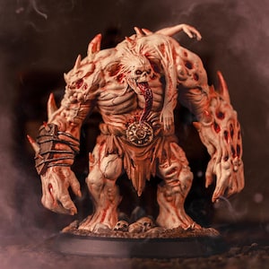 May include: A pale, muscular monster figurine with a skull-like head, a long protruding tongue, and red-accented sores. The creature features sharp spikes on its shoulders and arms, a dark strapped bracer on one wrist, and a circular belt buckle.