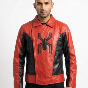 May include: Red and black leather jacket with a spider emblem. The jacket features a red body with black panels on the sides and sleeves. The spider emblem is prominently displayed on the chest. The jacket has a button closure and a collared neckline.