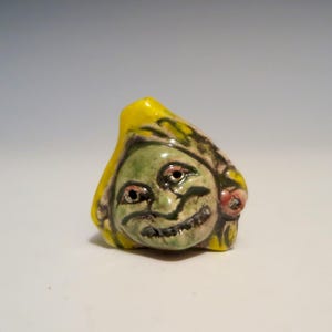 hand made face whistle with 24K gold enameling