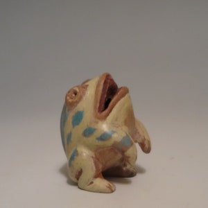 Hand carved spotted ceramic frog