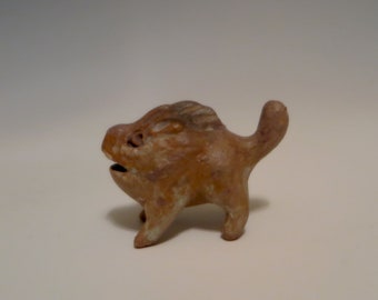 hand carved ceramic pig figurine