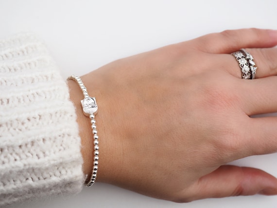 Silver buddha bracelet deals