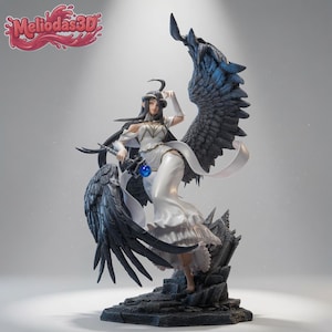 May include: A detailed figurine of a character with long black hair, wearing a white dress with gold accents, and large black feathered wings. The figure holds a staff with a blue orb and stands on a dark, rocky base. The text Meliodas3D is visible.