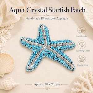 May include: An aqua crystal starfish patch, a handmade rhinestone applique measuring approximately 10 x 9.5 cm. The starfish is covered in bright blue circular rhinestones with silver-toned accents along the centre of each arm.