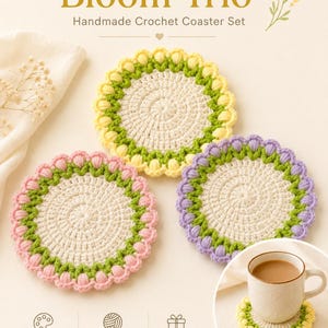 May include: A set of three round handmade crochet coasters titled Bloom Trio. Each coaster features a cream-colored center with a green inner border and an outer edge of small, raised petal-like stitches in yellow, pink, or light purple yarn.