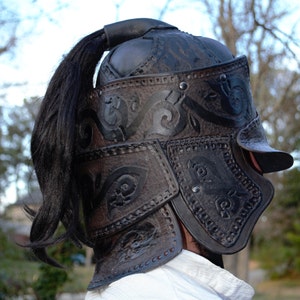 Heavily tooled leather battle helmet