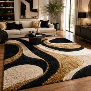 May include: A rectangular area rug featuring a high-pile texture with a repeating abstract pattern of flowing, curved shapes in contrasting shades of black, cream, and metallic gold, covering the floor in a living room setting.