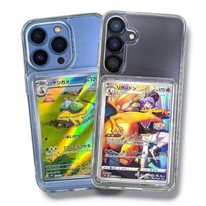 May include: Two clear phone cases, one blue and one black, each holding a Pok&eacute;mon trading card. The blue case has a card with a turtle-like creature. The black case has a card with a Charizard illustration.