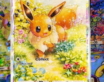 May include: A holographic Eevee Pokémon trading card. The card features an illustration of Eevee in a field of flowers. The card has the text "Eevee", "HP 60", "Draw a card", and "Collect". The card is surrounded by other Pokémon cards.
