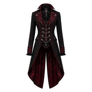 May include: A black and red gothic-style coat with intricate detailing. The coat features a high collar, decorative buttons, and a chain closure. The interior and lapels are a deep red with a floral pattern, creating a striking contrast.