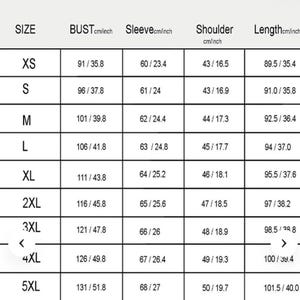 May include: A size chart with measurements in centimeters and inches for bust, sleeve, shoulder, and length. Sizes range from XS to 5XL. Measurements include bust from 35.8 inches to 51.8 inches, sleeve from 23.4 inches to 27 inches, shoulder from 16.5 inches to 19.7 inches, and length from 35.4 inches to 40 inches.