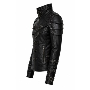 May include: A black jacket featuring a high collar with double buckle straps, layered shoulder panels with metal studs, and a front closure with multiple buckles and a decorative chain. The sleeves include adjustable buckle straps and metal rings.