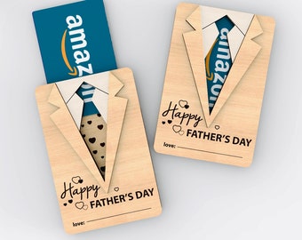 May include: A wooden card with a cutout of a suit jacket and tie. The card is designed to hold a gift card. The card has the text "Happy Father's Day" and a space for a personalized message. The gift card is an Amazon gift card.