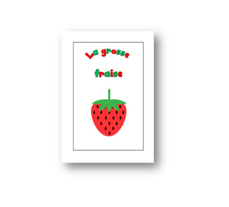 May include: A white card with the text "La grosse fraise" in red and green letters. A red strawberry with green leaves is below the text.
