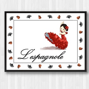 May include: A white framed print with a black border featuring a cartoon illustration of a woman in a red flamenco dress dancing. The text "L'espagnole" is written in cursive below the illustration. The border is decorated with black and white fans and red and brown castanets.