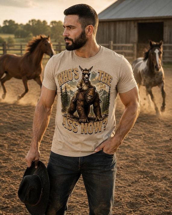 Who's The Ass Now? Funny Bigfoot Shirt, Donkey Riding Sasquatch Tee, Camping Humor Shirt, Cryptid Gift for Men