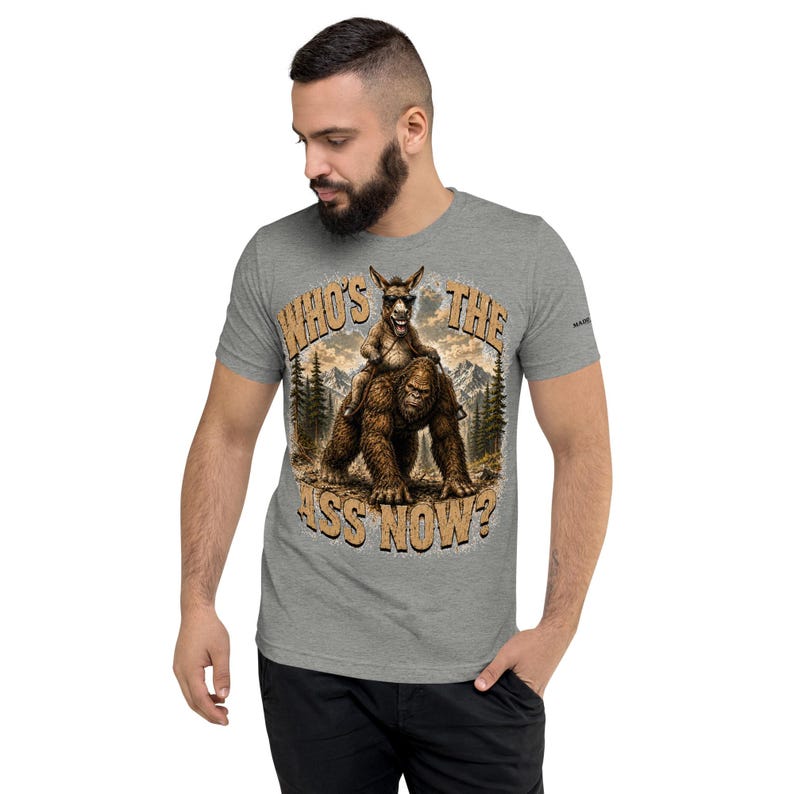 Who's The Ass Now? Funny Bigfoot Shirt | Donkey Riding Sasquatch T-Shirt | Camping Humor Tee | Funny Outdoor Shirt | Cryptid Gift For Men