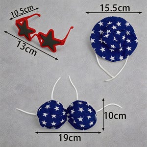 May include: A patriotic ensemble featuring red star-shaped sunglasses (13cm long), a blue hat (15.5cm diameter), and a blue bikini top (19cm wide) with white star patterns. The bikini top measures 10cm in height. Perfect for themed events.