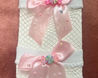 Medias de rejilla hasta el muslo blancas y rosas Kandi