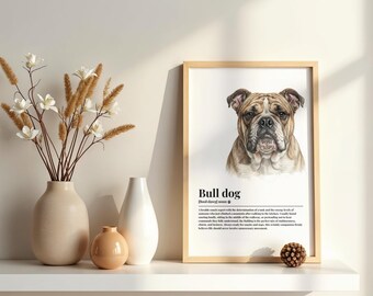 May include: A framed wall art print featuring a brown and white bulldog illustration with the text "Bull dog" and a dictionary-style definition. The print is displayed next to a beige vase with dried flowers and a small round beige vase.