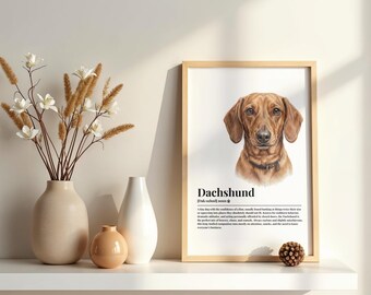 May include: A framed vertical print featuring a realistic illustration of a brown dachshund dog head, with the text "Dachshund" and a dictionary-style definition printed below the image in black ink on a white background.