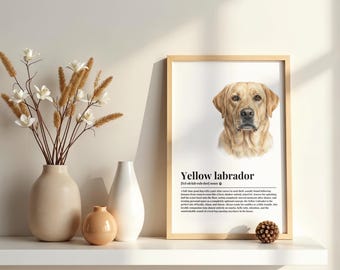 May include: A framed wall art print featuring a realistic illustration of a yellow Labrador dog head above the text Yellow labrador and a humorous dictionary-style definition. The print is displayed in a light wood frame on a white shelf.
