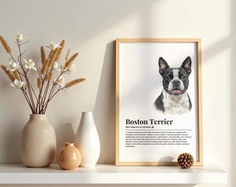May include: A framed wall art print featuring a black and white Boston Terrier illustration with the text 'Boston Terrier' and a dictionary-style definition below the image. The print is displayed in a light wood frame on a white shelf.