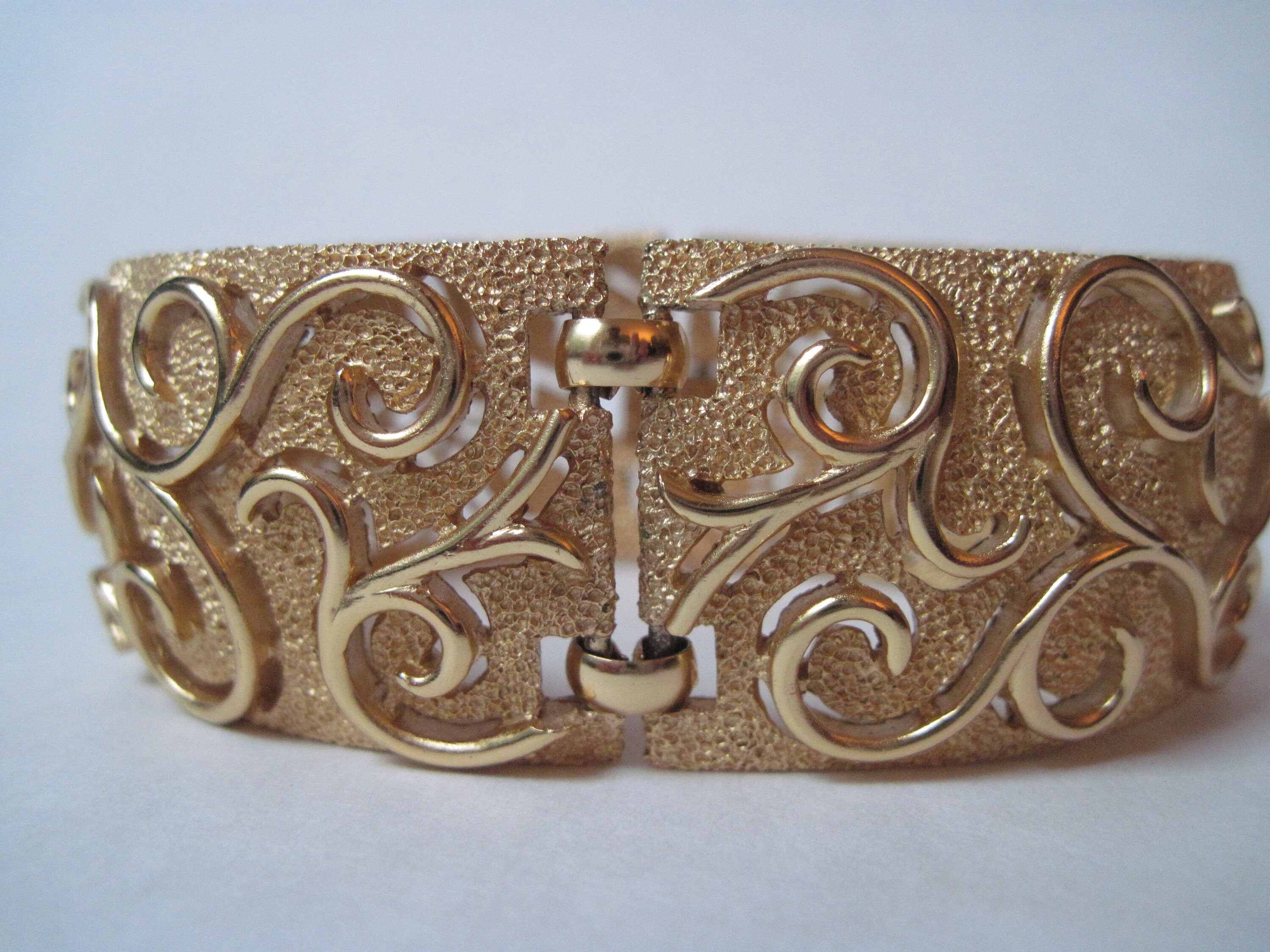 Vintage Crown Trifari Gold Tone Textured Open Scroll Work Wide Link Bracelet