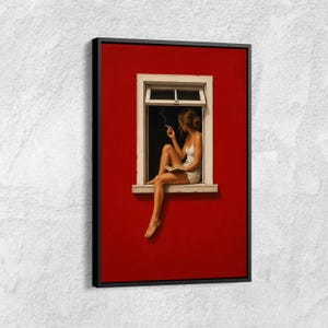Puede incluir: Una impresión de arte mural enmarcada que muestra a una persona de cabello castaño claro sentada en un marco de ventana blanco contra una pared roja sólida. La persona viste una camiseta sin mangas y pantalones cortos blancos, sostiene un libro.