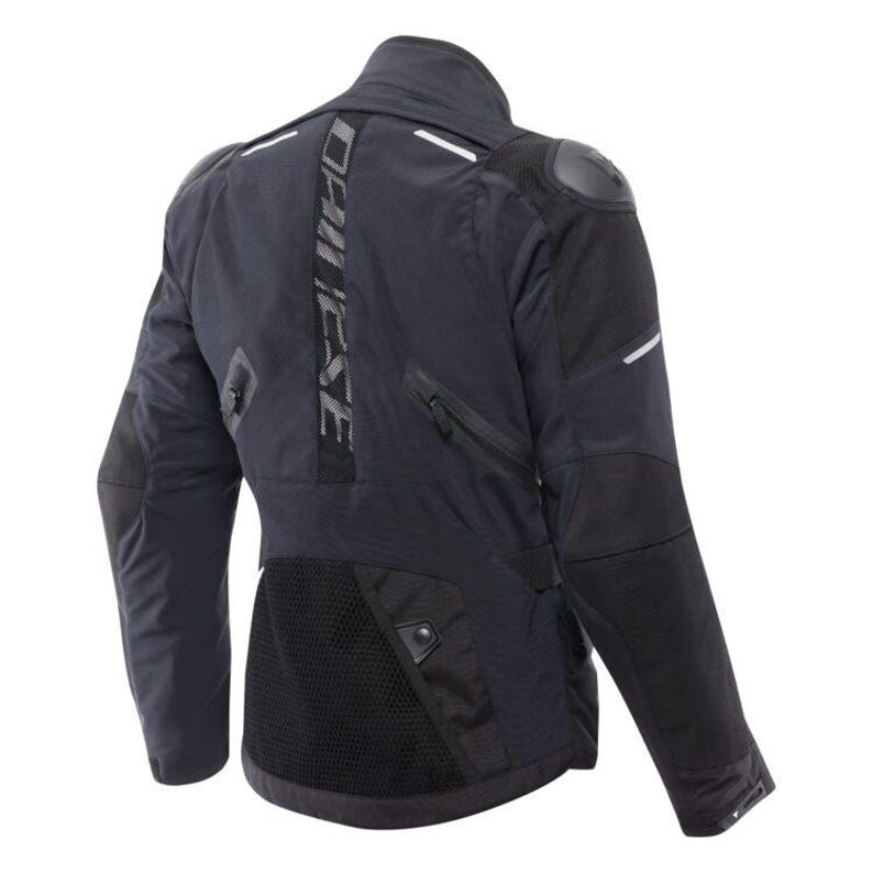 May include: Black motorcycle jacket with the brand name "DAINESE" printed vertically on the back. The jacket has reflective stripes, padded shoulders, and a mesh panel on the lower back. It features multiple zippered pockets and a high collar.