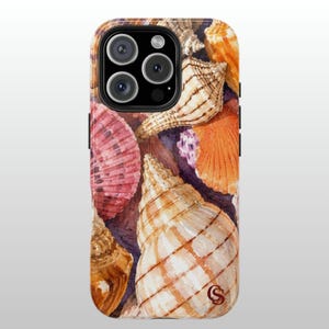 May include: A smartphone case featuring a watercolor illustration of various seashells in shades of orange, pink, and brown. The design includes a prominent spiral shell in the foreground and a small dark red monogram logo in the bottom right corner.