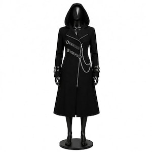 May include: A long black hooded coat featuring an asymmetrical silver zipper closure, two horizontal buckled straps across the chest, and matching buckled straps on each cuff. A decorative silver chain is attached to the chest area.