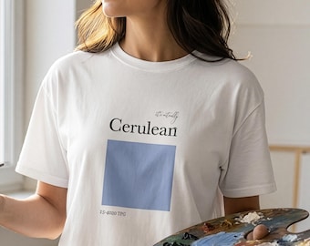 プラダを着た悪魔 セルリアンブルーTシャツ、ファッション映画グラフィックTシャツ、ミニマリストファッション愛好家へのギフト