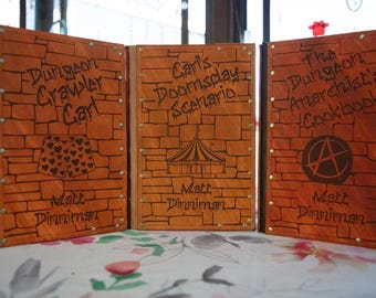 Dungeon Crawler Carl books 1-3 with leather covers