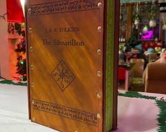 The Silmarillion, illustrated by the author with custom leather cover.