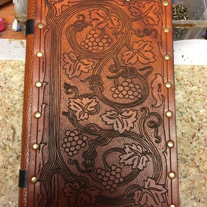 Sketch book with custom leather cover.